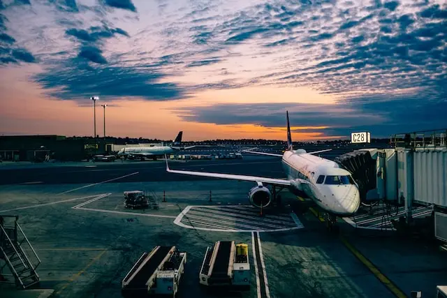 Airplane at gate in the dawn