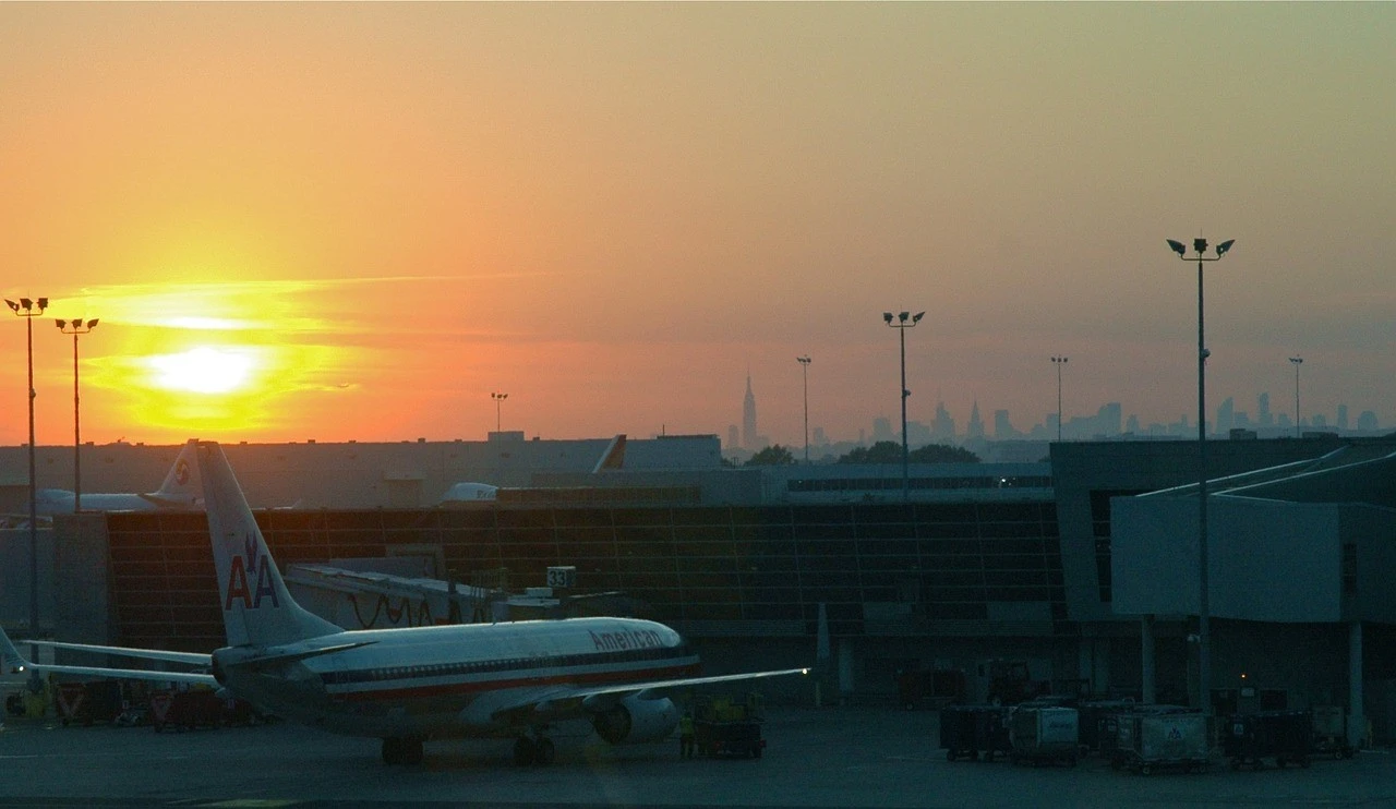 Airport in the dusk with an airplane waiting at the gate